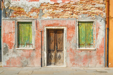 Fototapeta na wymiar Colorful old house on The Burano island near Venice, Italy, Europe.