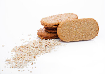 Healthy bio breakfast grain biscuits with oats  on white background