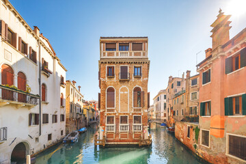 The canals with historic buildings in Venice, Italy, Europe.