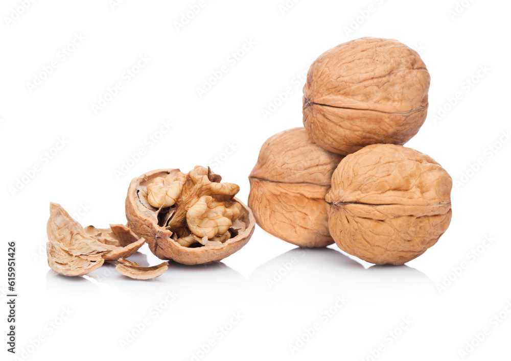 Poster raw walnuts with shell on white background with reflection