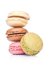 French luxury colorful macarons dessert cakes on white background with sugar on top