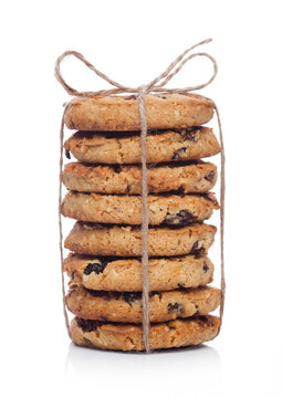 Gluten free oatmeal chocolate cookies with rasins on white background
