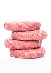Raw fresh beef burgers on white background with reflection