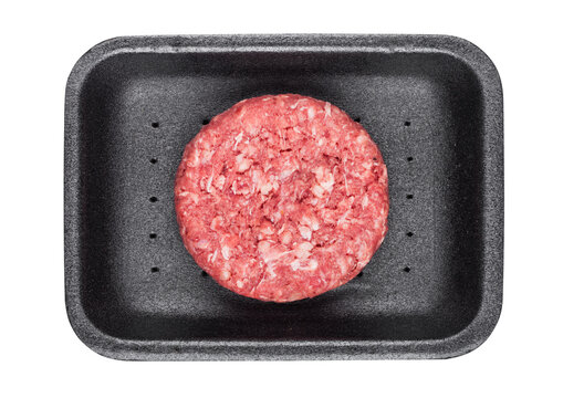 Raw fresh beef burger in plastic tray on white background - Powered by Adobe