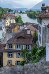Fototapeta na wymiar Blue water, towers and landscape in Bern Switzerland