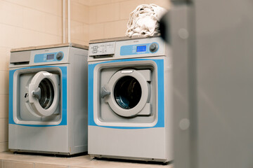 industrial washing machine Hotel laundry services Clothes dryer concept of cleanliness and hospitality