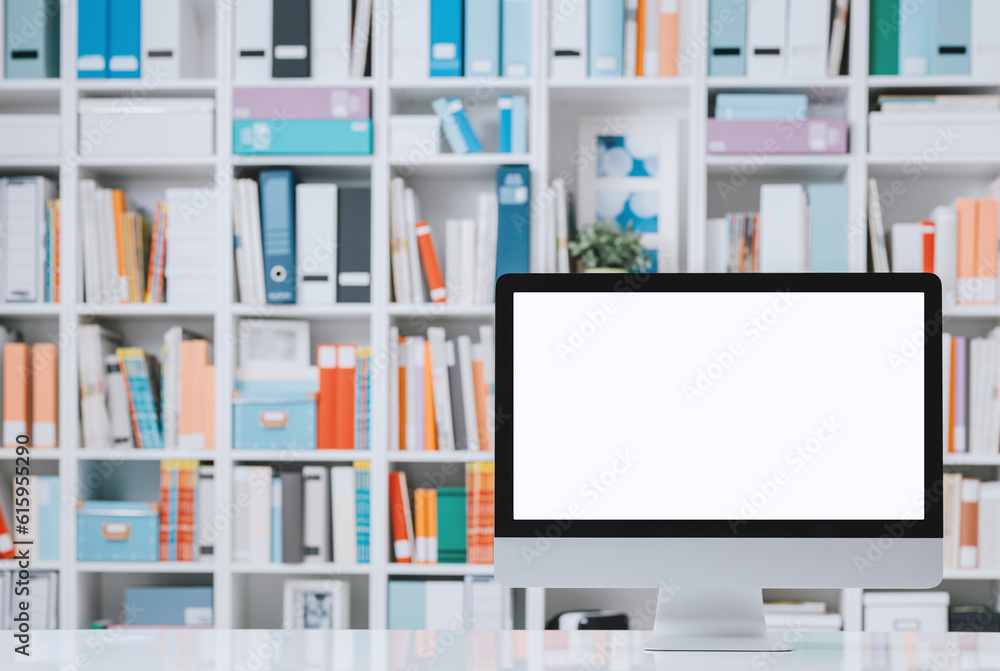 Poster professional creative workspace with computer on a white desktop and colorful folders on the shelves