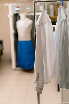 ironing mannequin for clothes in an industrial hotel laundry concept of cleanliness and hospitality housekeeping