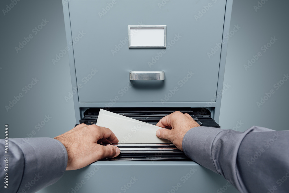 Poster office clerk searching for files in the filing cabinet, data storage and archives concept, personal 