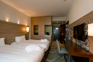 interior of a double hotel room after cleaning housekeeping bedroom rest room concept of cleanliness and hospitality travel rest