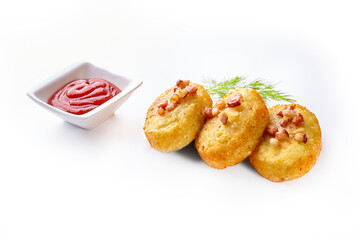Potato dumplings - a traditional regional dish. Polish and Lithuanian cuisine. With fried bacon on a white plate.