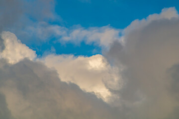 Textured clouds that change in different places in different ways and form unique instantaneous and inimitable outlines. The concept of natural backgrounds for thematic sketches and design solutions.