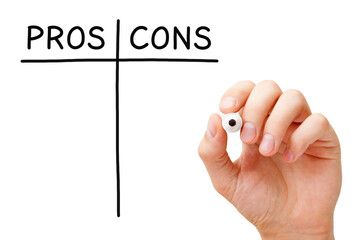 Hand writing Pros and Cons list with black marker on transparent wipe board isolated on white.