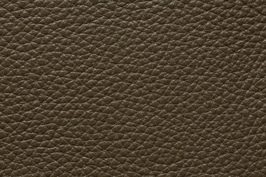 Contrast leather background in dark grey colour. High resolution photo.