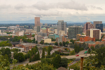 Fototapeta premium Portland Oregon downtown cityscape scenic view by freeway nestled among trees