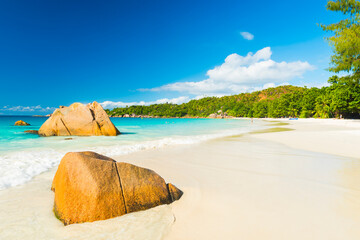 Beautiful and a famous beach Anse Lazio with granite boulders, Praslin island, Seychelles.