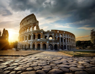 Fototapeta na wymiar Bright sunset over Colosseum in Rome, Italy