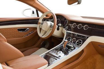Modern supercar interior with the leather panel, sport seats, multimedia, and digital dashboard....