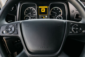 steering wheel and instrument panel of a new modern heavy truck tractor