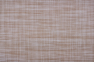 A piece of cloth made of burlap brown as the background