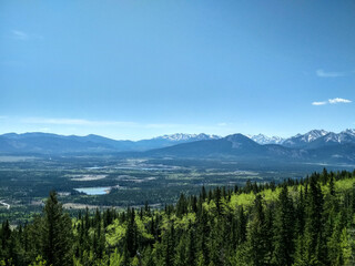 Hiking views from Mount John Laurie Yamnuska overlooking the foothills and prairies of Alberta