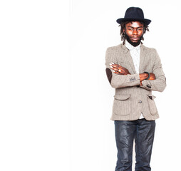 young handsome afro american boy in stylish hipster hat gesturing emotional isolated on white background smiling, lifestyle people concept close up