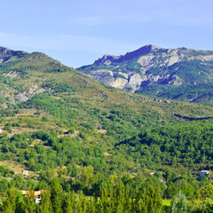 Fototapeta na wymiar Alpine landscape of Alpes-de-Haute-Provence department in southeastern France. Neighborhoods of a medieval city of Castellane