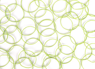 Close view small rubber bands on a white background