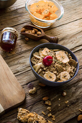 Healthy breakfast variety. Cereals with fruit. Yogurt with seeds