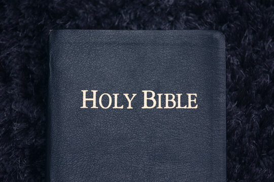 Top View of Holy Bible On Dark Texture