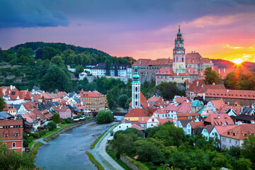 Aerial cityscape image of Cesky Krumlov, Czech Republic during summer sunset.