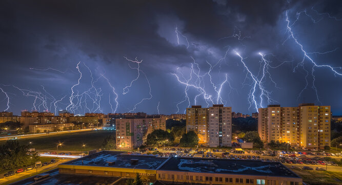Many Lightnings Over Housing Estate. Night Storm in the City.