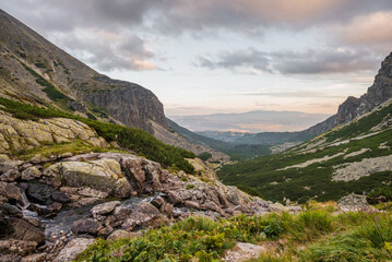 Obraz premium Mountain Landscape with Creek Flowing over the Rocks. Mlynicka Valley, High Tatra, Slovakia.