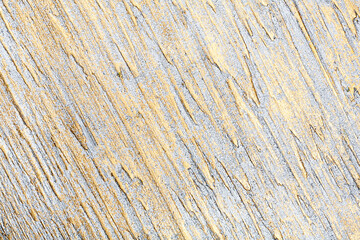 White and golden lined wall stucco texture background. Decorative wall paint.