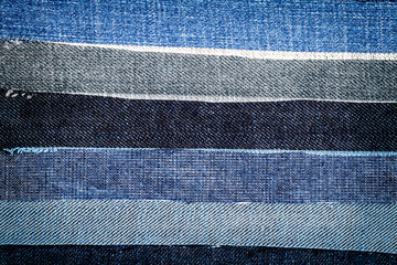 Abstract different torn jeans stripes texture background. Jeans texture. Striped jeans background....