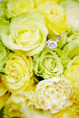 wedding bouquet and diamond ring