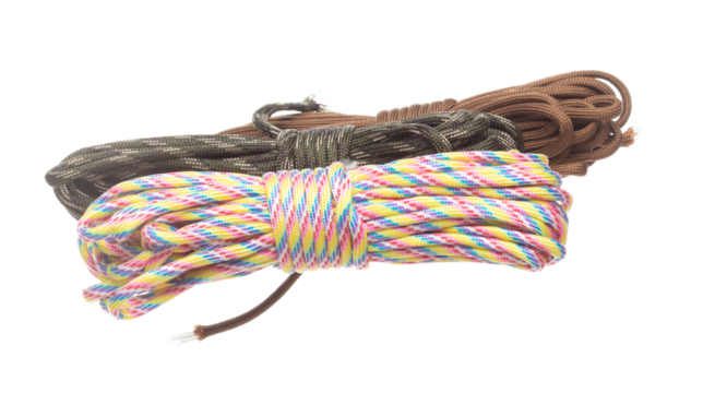 Pack group Climbing Rope roll fly in air. Strong safety climbing rope for sport mountain hobby, need safety gear to lock hold weight of climber rope. White background isolated