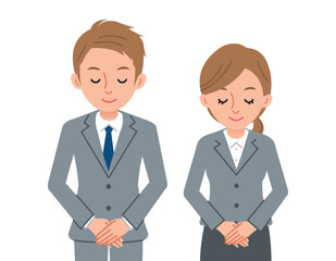 お辞儀をするビジネスパーソン（男女）