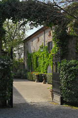 Fototapeta na wymiar Old Italian country estate with ivy