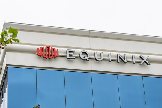 Close up of Equinix sign on its Silicon Valley office building in Sunnyvale, California, USA on June 10, 2023. Equinix is an American company that specializes in Internet connection and data centers.