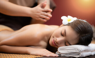 Obraz na płótnie Canvas Young Beautiful Woman relaxing massage