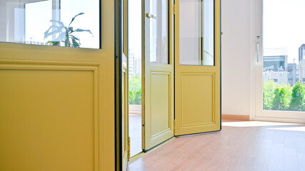 The house is decorated with a fresh feeling with lime-colored folding doors