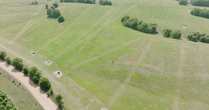 View From Above Of Outdoor Rifle Range With Equipment At The Field In Leach, Oklahoma. aerial tilt-up