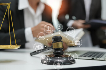 judge on wooden table And experienced lawyers meet with clients and give advice behind the scenes. legal services legal consulting concept