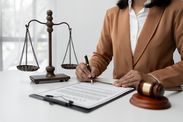 Businesswoman, lawyer working on legal treaty documents for business signing, financial investment signing, clarification explained in the legal limitations Consulting Concept Justice