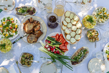 Top of view full table of ukrainian meals on the table for eat. Table with many ready meals and...