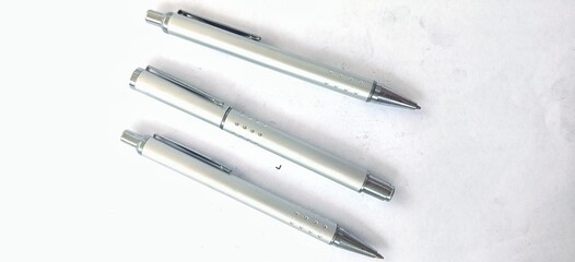 Three pens on a clean white background. Graphics. For illustration.