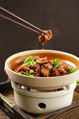 Chinese braised pork ribs, Chinese food made from pork ribs, cilantro, onion