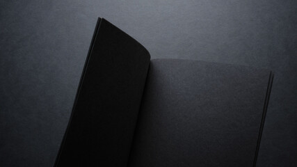 black book on a dark background