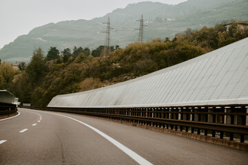Solar modules at Italian highway. Solar Highways is a noise barrier along the motorway